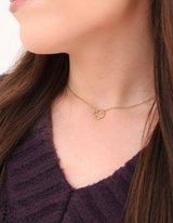 Boucles d'oreilles et collier Divine or